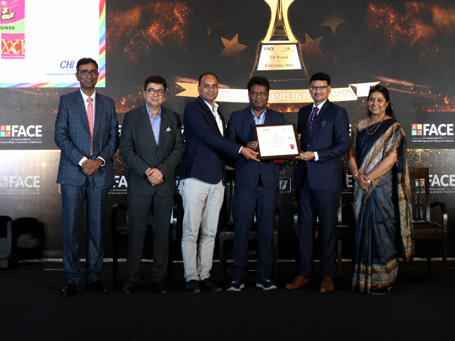Geofast team receiving an industry recognition certificate