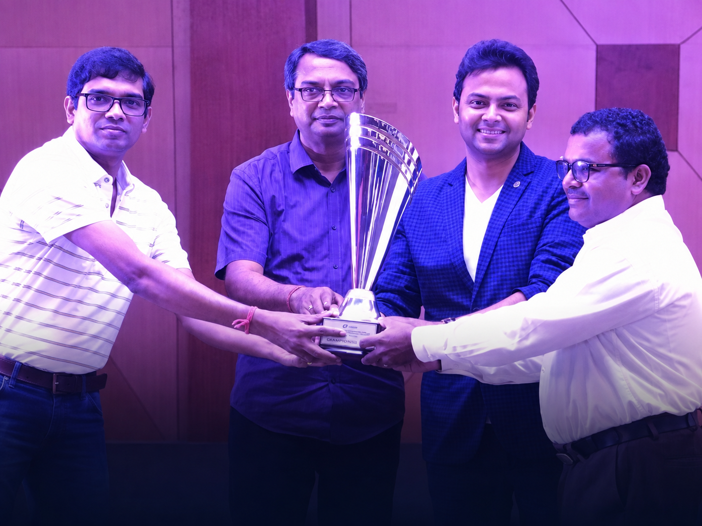 Geofast team receiving an industry award trophy