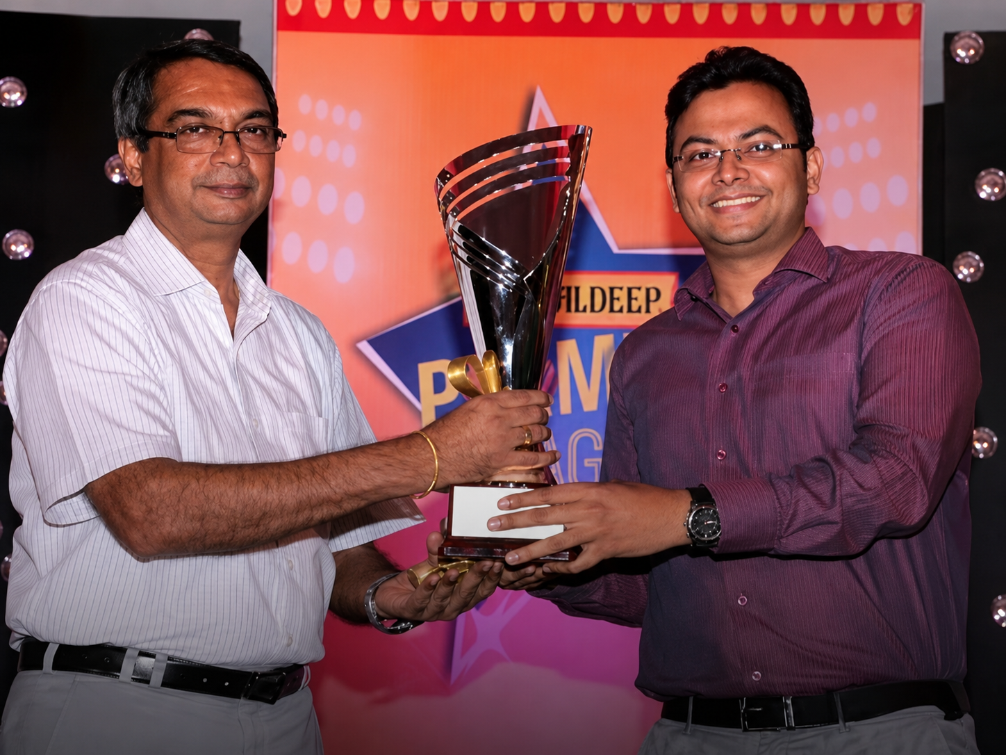 Geofast representative receiving a trophy